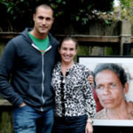 Nigel Barker with photographer Clare Allen Crook preparing photos for the exhibition